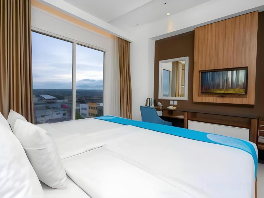 จาวา โลตัส โฮเทล เจมเบอร์  Hotel ภายนอก รูปภาพ